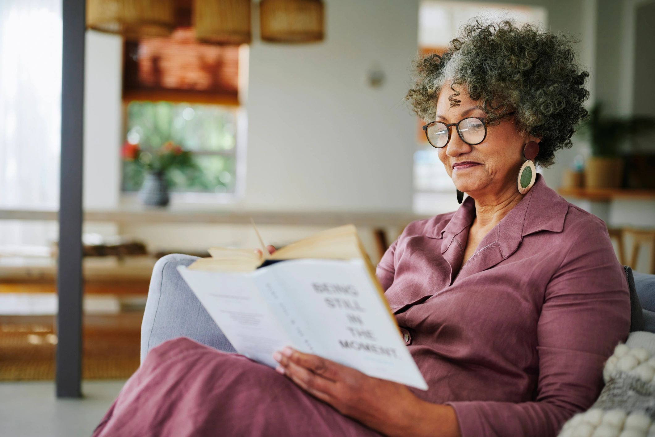 Reader enjoying a book at home